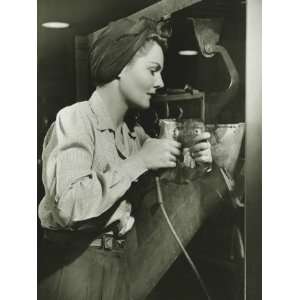  Woman Working With Electric Drill in Factory Photographic 