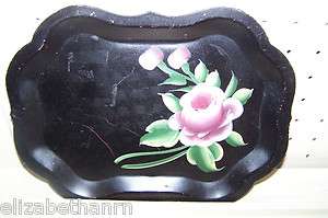 Gorgeous black tray with floral designs. Antique and unique  