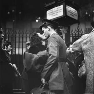  Station Sharing Farewell Kiss Before He Ships Off to War During WWII 