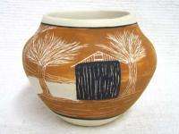 This is a fabulous authentic handcrafted Acoma Storyteller pottery 