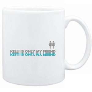  Mug White  Kelli is only my friend  Female Names Sports 