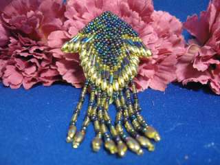 BRAND NEW Black iris beads and gold beading. Measures approximately 4 