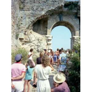  A Group of Tourists Visiting Ruins in Corfu, Greece 