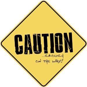   CAUTION  CROUCH ON THE WAY  CROSSING SIGN