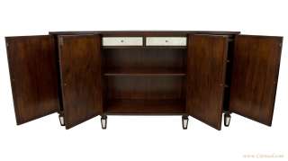   sideboard was manufactured by john richard fine furniture it features