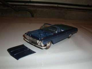 Restored Nassau blue 1962 Impala convertible promo,   