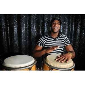  Portrait of Young Latino Percusionist Playing African 