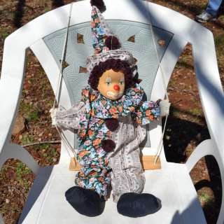 Large Swinging Porcelain Clown Wearing Mixed Clothes  