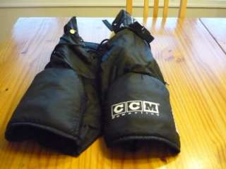 CCM Hockey pants with pads lace up with buckle size youth Small  