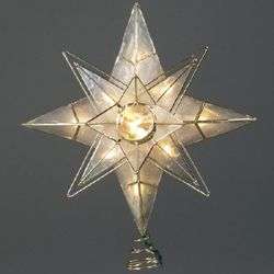 This tree topper is delicately crafted of capiz and is formed of two 