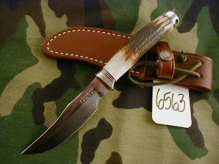 stag handle duraluminum butt rounded wrist thong and brown sheath call 