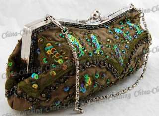   as clutch wallet handbag or shouder bag with the metal chain strap