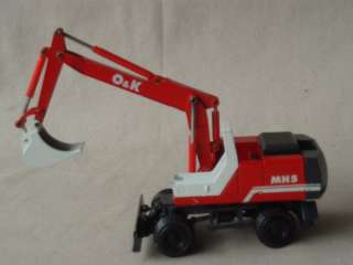 vintage O & K toy excavator MH5, made in Germany in 1970s . The toy 