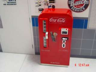 Here is a 116 / 118 scale Coke Machine we built up for show.