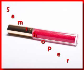 Estee Lauder Pure Color Lip Gloss in 24 Fuchsia Fantasy shimmer  