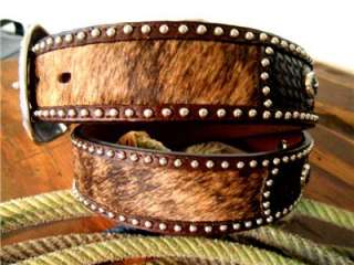 THIS HANDSOME HAND TOOLED WESTERN BELT IS MADE OF GENUINE LEATHER AND 